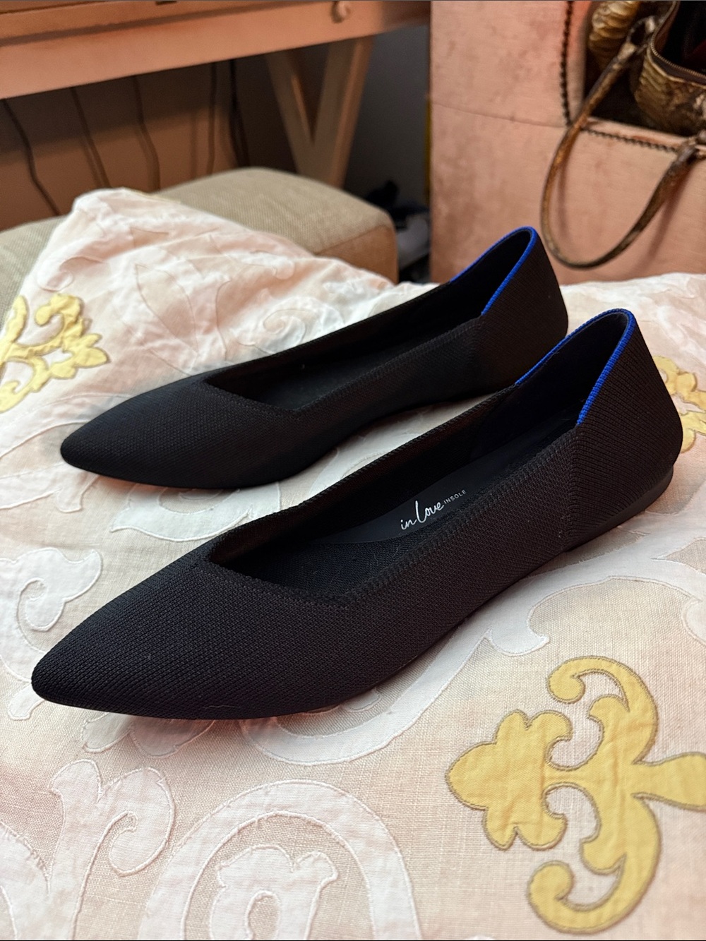 Rothy’s black pointy flats size 10.5